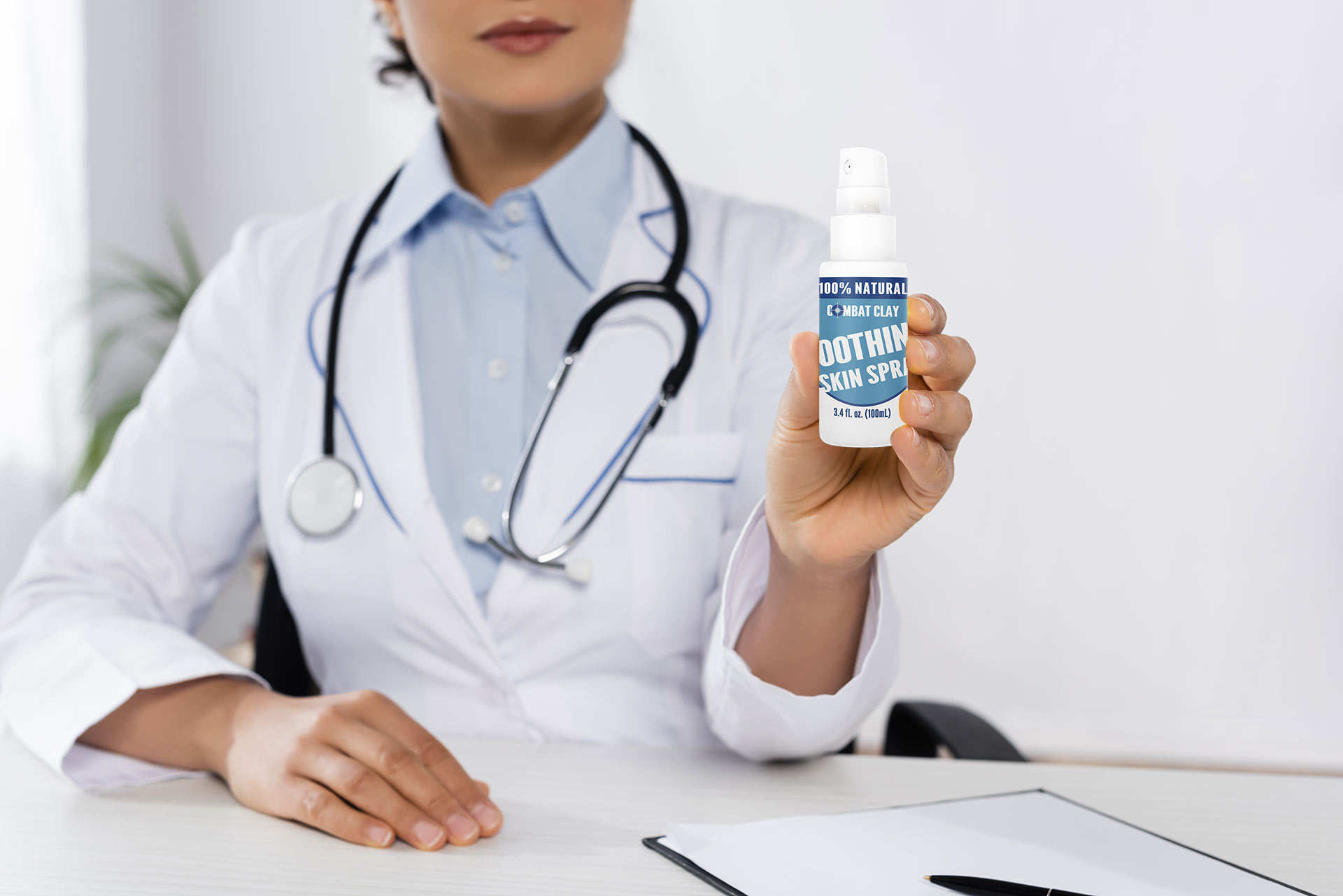 Person-Holding-Combat-Clay-Soothing-Skin-Spray